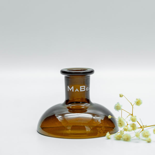 Kleiner witziger Kerzenständer aus der leeren Gin Flasche