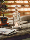 Schlicht und Schön mit dem gewissen Etwas - Windlicht aus einer Wodka Falsche