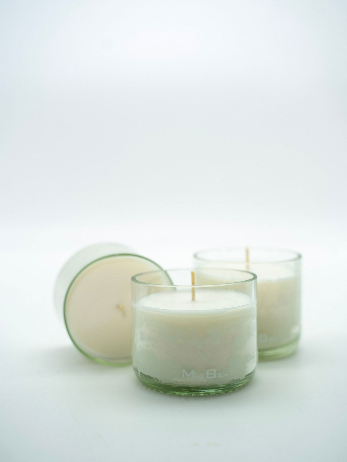 Rapswachs Kerze upcycling in transparenten Weinflaschenunterteil - MaBe®