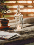 Schlicht und Schön mit dem gewissen Etwas - Windlicht aus einer Wodka Falsche
