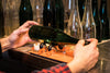 Adventskranz aus der Wein Flasche in oliv und goldenen Zahlen