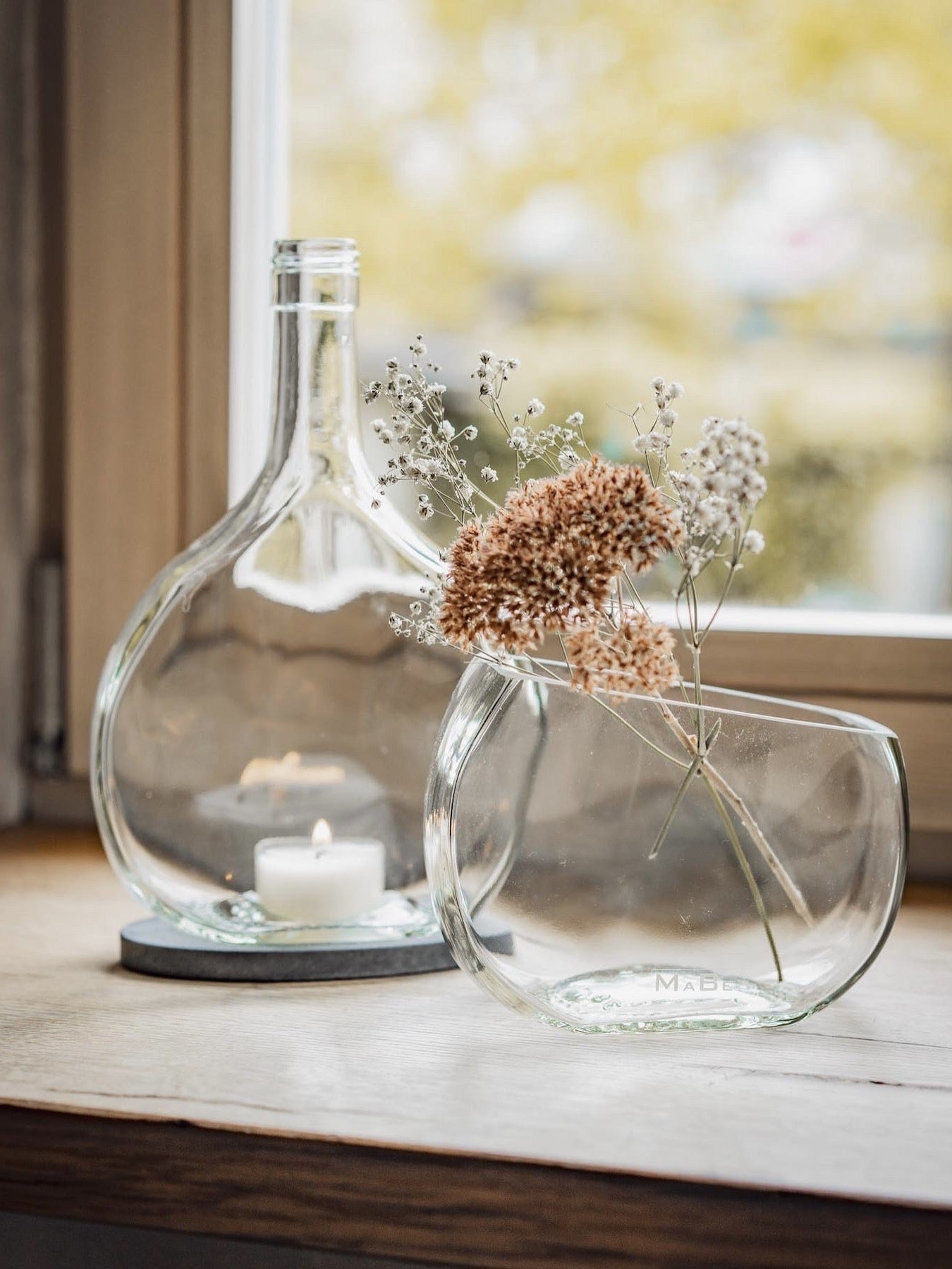 DESIGN – WINDLICHT & Vase aus dem fränkischen Bocksbeutel in transparent